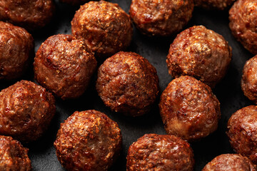Beef meatballs in iron cast pan. Fast food, Take away food