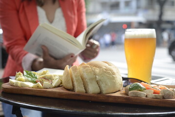 Girl reading during brunch