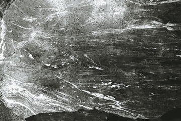 marble texture in water drops. Black and white macro photography.Stone photo wallpaper.Texture stone wall. Wet marble background.