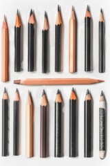 A collection of pencils arranged side by side