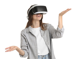 Smiling woman using virtual reality headset on white background