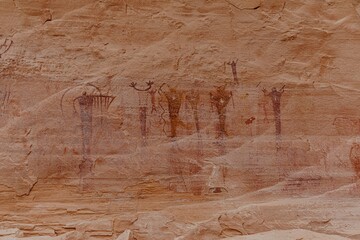 Historical Pictographs from ancient culture on canyon wall in Buckhorn Wash, Utah, United States of...