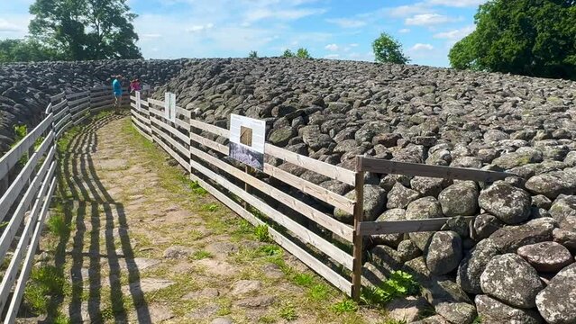 Entrance to Kings grave, a 75-meter-diameter Bronze Age cairn containing a coffin with ten stone slabs with carved figures, in Kivik, Simrishamn Municipality, Sk&aring;ne County, Sweden, Scandinavia, Europe