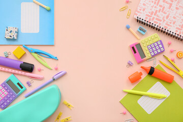 School supplies with calculator, marker and copybook on beige background. Top view