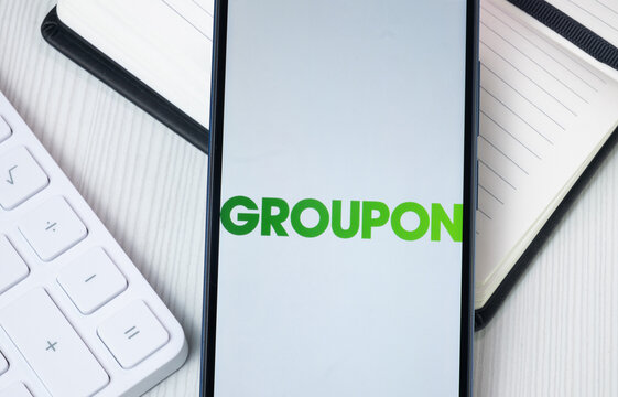 New York, USA - 30 June 2024: Groupon Logo on Phone Screen, Company Icon