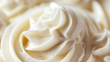 Close-up of luscious, creamy white frosting showcasing its rich texture, perfect for bakery advertisements and culinary blogs.