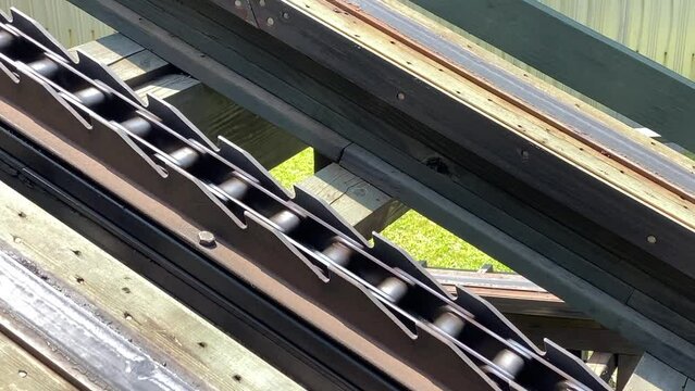 Chain of rollercoaster at first hill lift
