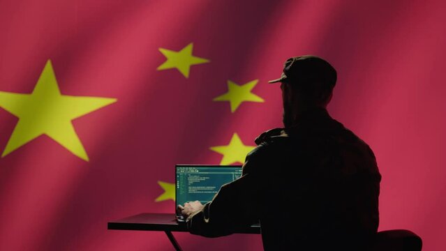 Chinese engineer making troll accounts on social media promoting communist ideology. Software developer building algorithms to spread CCP government socialist doctrine, camera B