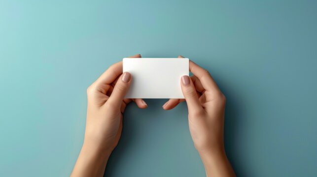 Blank credit card mockup in hand on clean background, shopping in store, transaction at terminal, secure payment, financial services advertising