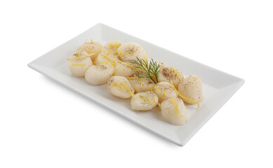 Raw scallops with milled pepper, dill and lemon zest isolated on white