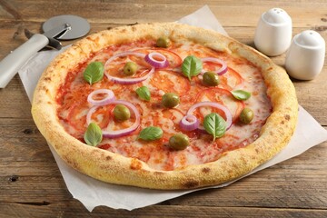 Delicious vegetarian pizza on wooden table, closeup
