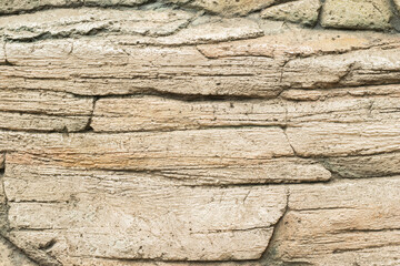 Textured Rock Wall Surface with Layered Stone Detail for Rustic and Natural Design Applications