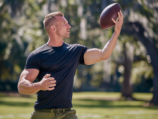 white man catching football wearing a blank black shirt