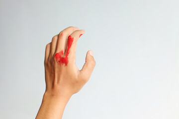 Potrait Of Bloody Hands Injured Over White Background