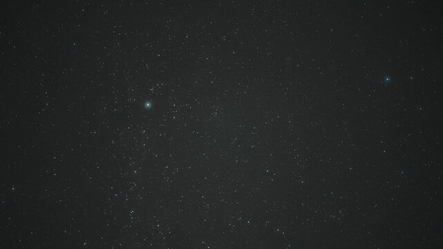 The serene beauty of the twinkling stars contrasts against the vast expanse of the night, capturing the magic of the cosmos.