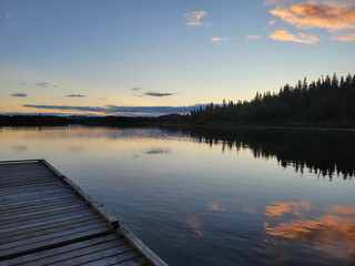 Sunset on the dock and lake