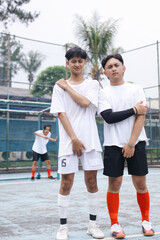 Asian Boys Soccer Team Doing The Wall To Defend Against Free Kick