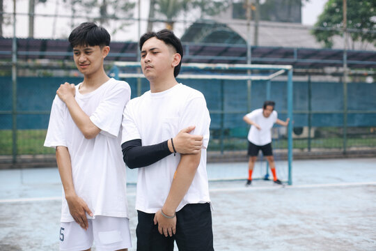 Soccer Players Preparing The Wall For A Free Kick