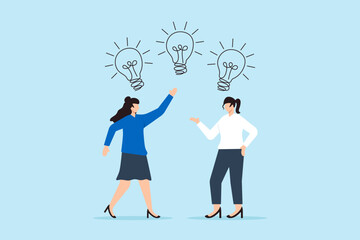 Two businesswomen brainstorming with light bulb above head concept creativity ideas and problem-solving