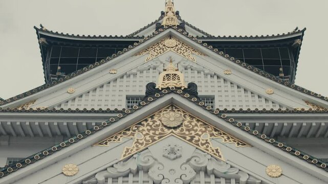 Tenshu Of Osaka Castle In Osaka, Japan. Azuchi-Momoyama Castle. low angle, tilt-up shot