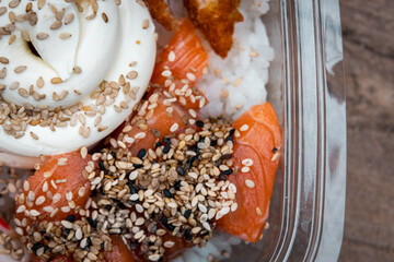 Sushi roll with salmon rice fried sweet potato cheese seaweed delivery