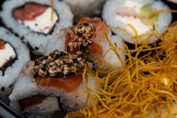 Sushi roll with salmon rice fried sweet potato cheese seaweed delivery