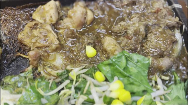 a very delicious mixed beef and chicken teppanyaki dish at a Japanese restaurant