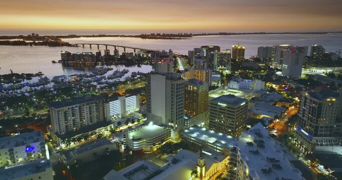Sarasota, Florida at night. American city downtown with office buildings. Real estate development in Florida. USA travel destination. USA travel destination