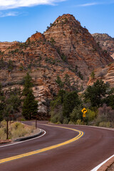 Picture yourself navigating through the stunning roads of Zion National Park in Utah, with breathtaking rock formations and lush greenery around you. A true adventure in nature awaits