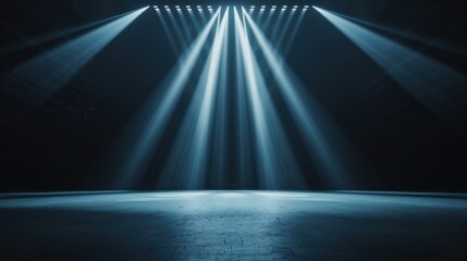 Abstract background with multiple beams of light shining down on a dark, empty stage.