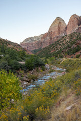 Experience the stunning beauty of Zion National Park in Utah, with its majestic rock formations, tranquil river, and lush greenery. Perfect for hiking, photography, and exploring the wilderness
