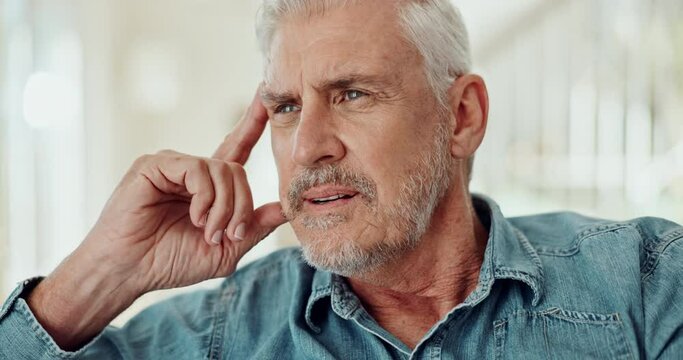 Thinking, worry and senior man in nursing home with fear, memory loss or overwhelmed by Alzheimer. Remember, nervous and elderly male person in living room with anxiety, questions or lost in a house