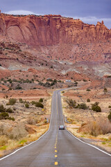 Experience the beauty of Bryce Canyon National Park in Utah with its red rock formations and desert landscapes, ideal for hiking and sightseeing in the picturesque terrain under a clear sky