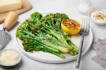 roasted broccolini with cheese and garlic, selective focus