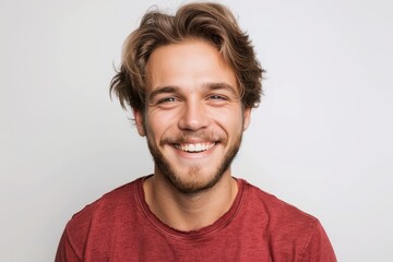 Fototapeta premium Portrait of attractive glad cheerful man over neutral background