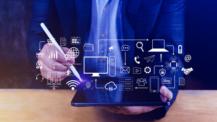Businessman using technology equipment and line interface icons, Computer system resources and data storage, Cloud service technology marketing and business concept.