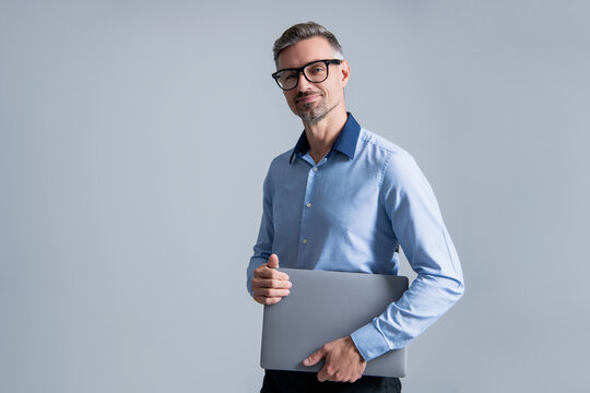 Online marketing manager. Business success. CEO manager businessman isolated on grey. Video conferencing. Successful business man using laptop. Businessman work online. Online security