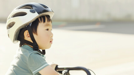 Child in bicycle helmet and safety gear rides bike on light surface, promoting safety and activity for children's health. Ideal for Children's Health Day or community cycling events.

