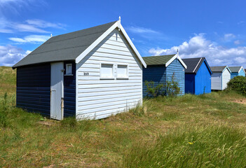 Pastel color wooden beach hut at Old Hunstanton, Norfolk, UK