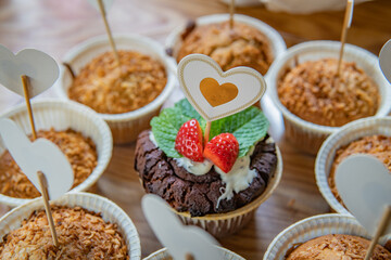 Wedding Reception Dessert Table With Chocolate and Coconut Cupcakes