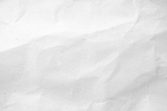 White recycled craft paper texture as background. Grey paper texture.