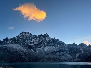 The Gokyo lake and Himalaya mountain with golden cloud