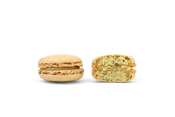 Macaroons with pistachio filling isolated on white background.