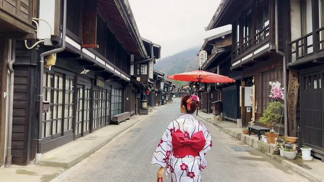 Asian woman wearing japanese traditional kimono at Narai juku in Nagano, Japan. 04 20 2024