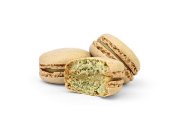 Macaroons with pistachio filling isolated on white background.