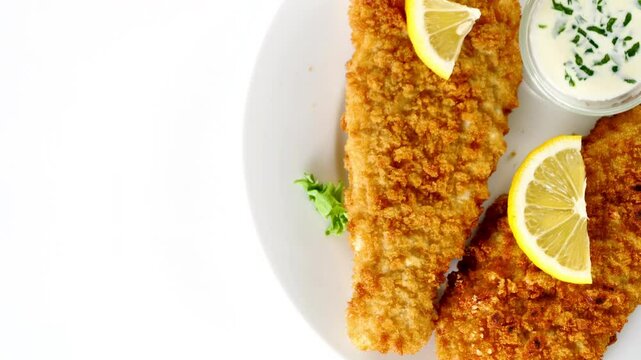 fried fish fillet with lemon slice