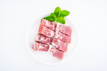 A plate of fresh pork spine