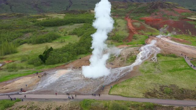  Flying above Strokkur geysir in the moment of eruption, Iceland, aerial slow motion view