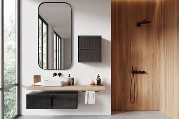 Minimalist hotel bathroom interior with sink and shower, panoramic window