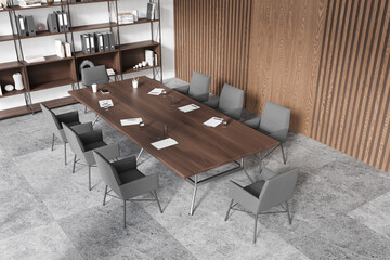 Top view of office meeting room interior with table and armchairs, shelf